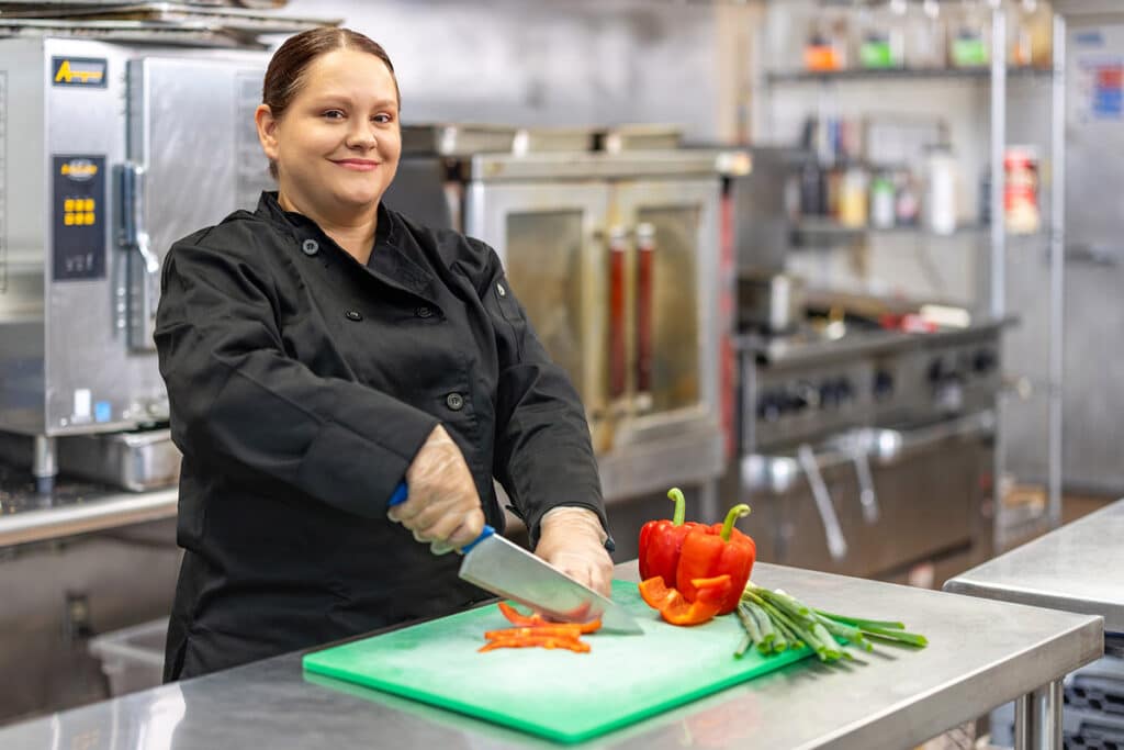 Chef cutting vegetables at Ahwatukee Post Acute