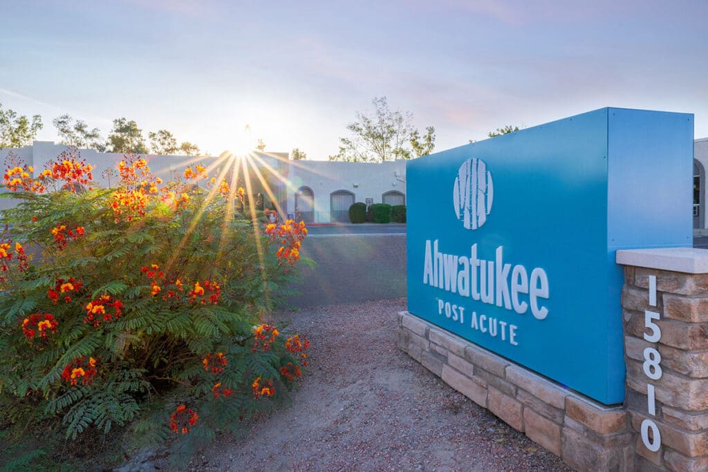 Flower bush next to Ahwatukee Post Acute's outdoor sign
