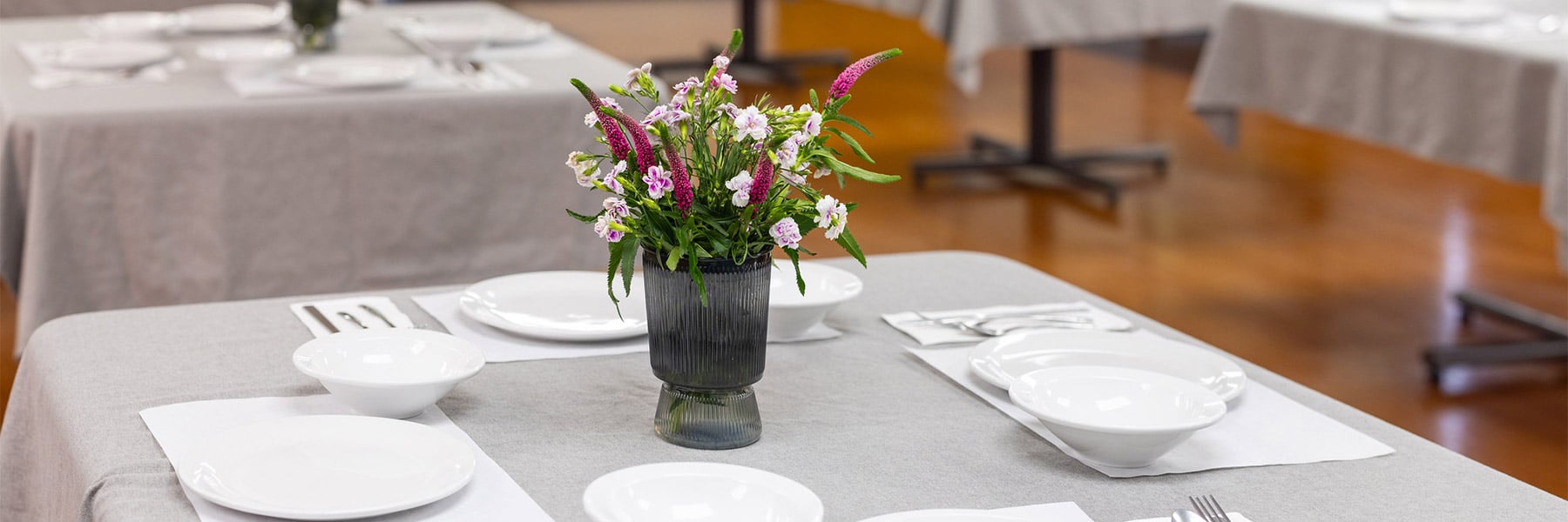 Flowers on a set dining table at Ahwatukee Post Acute