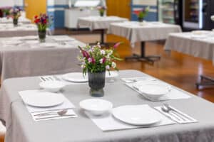 Flowers on a set dining table at Ahwatukee Post Acute